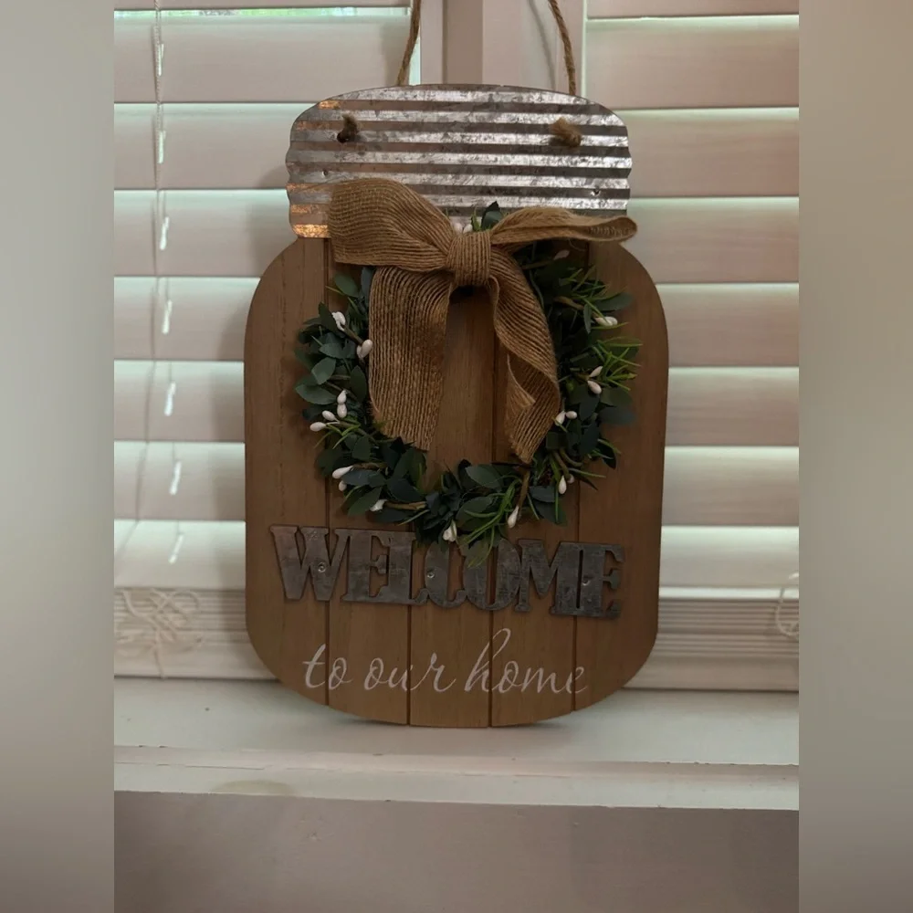 Rustic Welcome Sign with Greenery and Bow